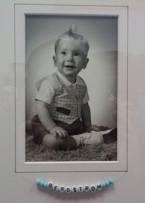 This customer held onto a baby bracelet but the cord broke long ago.  With the aid of a hand drawn border, the holes the string is run through is disguised and the bracelet hangs naturally under the photo.  